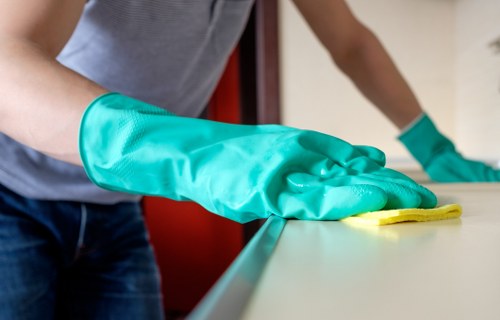 Room-by-room house cleaning setup in a modern home