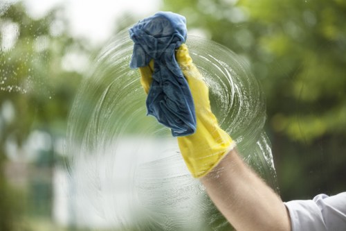 Commercial window cleaning on a storefront with clear glass