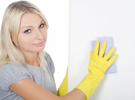 Bathroom domestic cleaning with sanitizing products and fresh surfaces